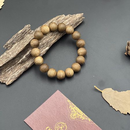 Agarwood beads are expertly crafted into exquisite bracelets, valued for their natural fragrance and spiritual significance.