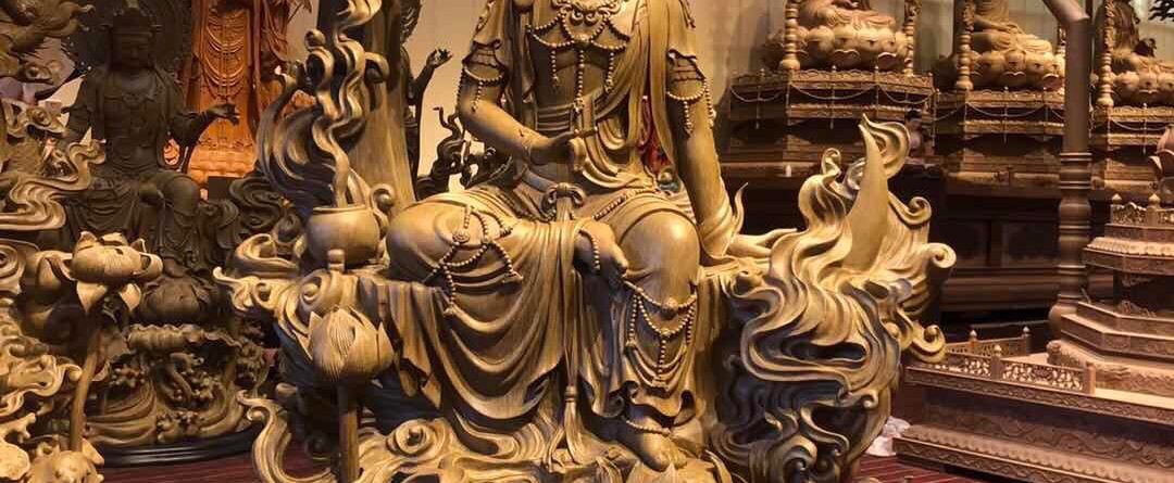A beautifully crafted statue of Quan Thế Âm Bồ Tát made from agarwood,
