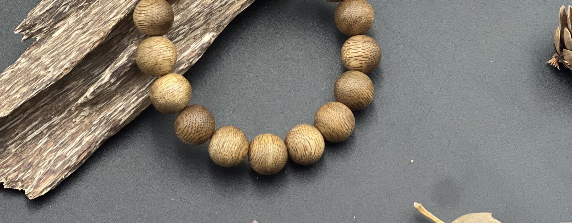 Agarwood beads are expertly crafted into exquisite bracelets, valued for their natural fragrance and spiritual significance.