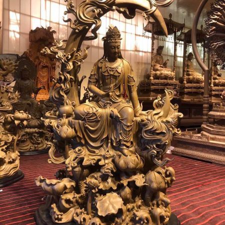 A beautifully crafted statue of Quan Thế Âm Bồ Tát made from agarwood,