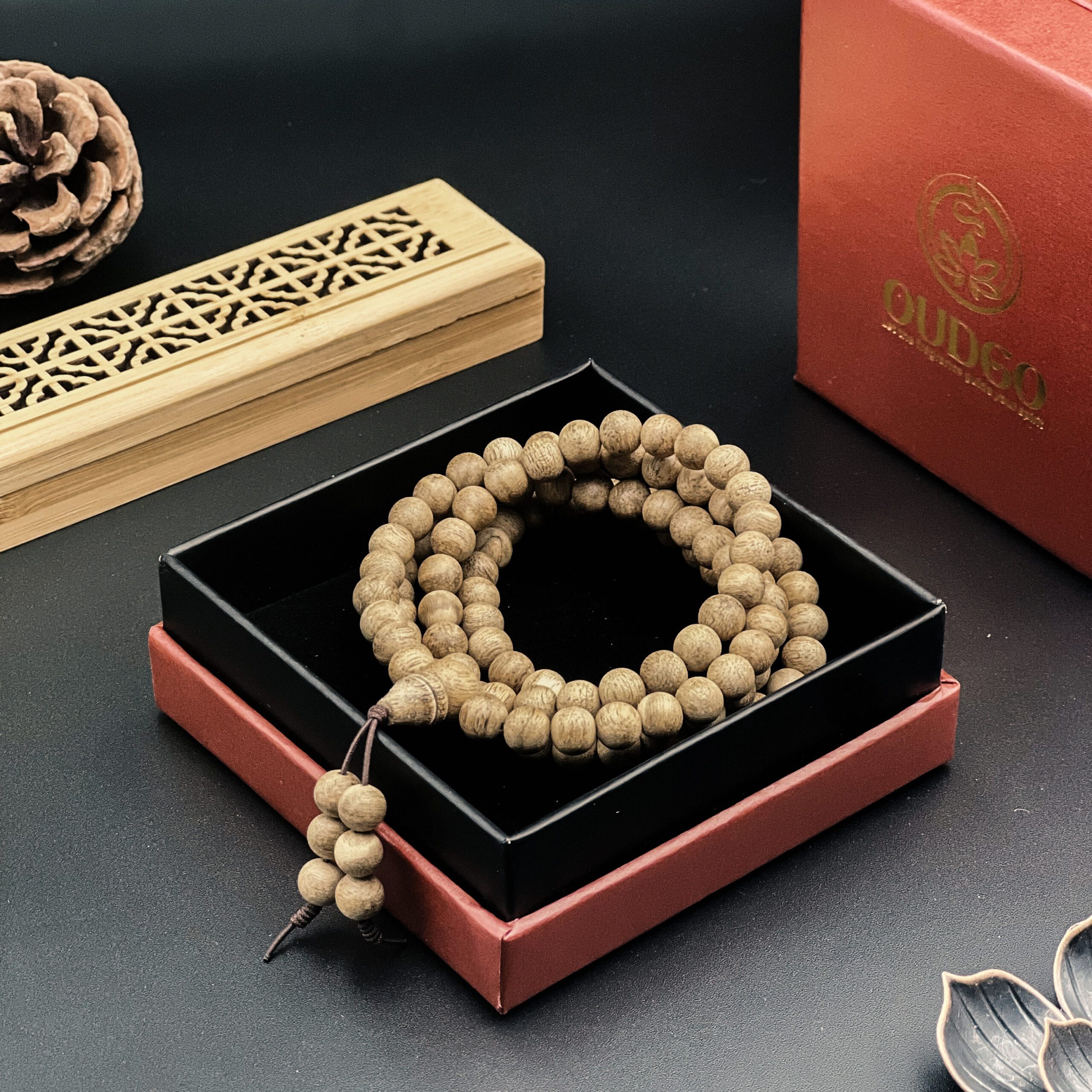 A 108-bead agarwood bracelet symbolizes spiritual enlightenment and the release from 108 earthly desires in Buddhist philosophy.