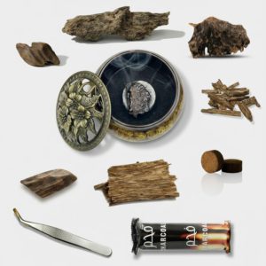 Agarwood Starter Kit contents with ceramic burner, samples, charcoal and tongs